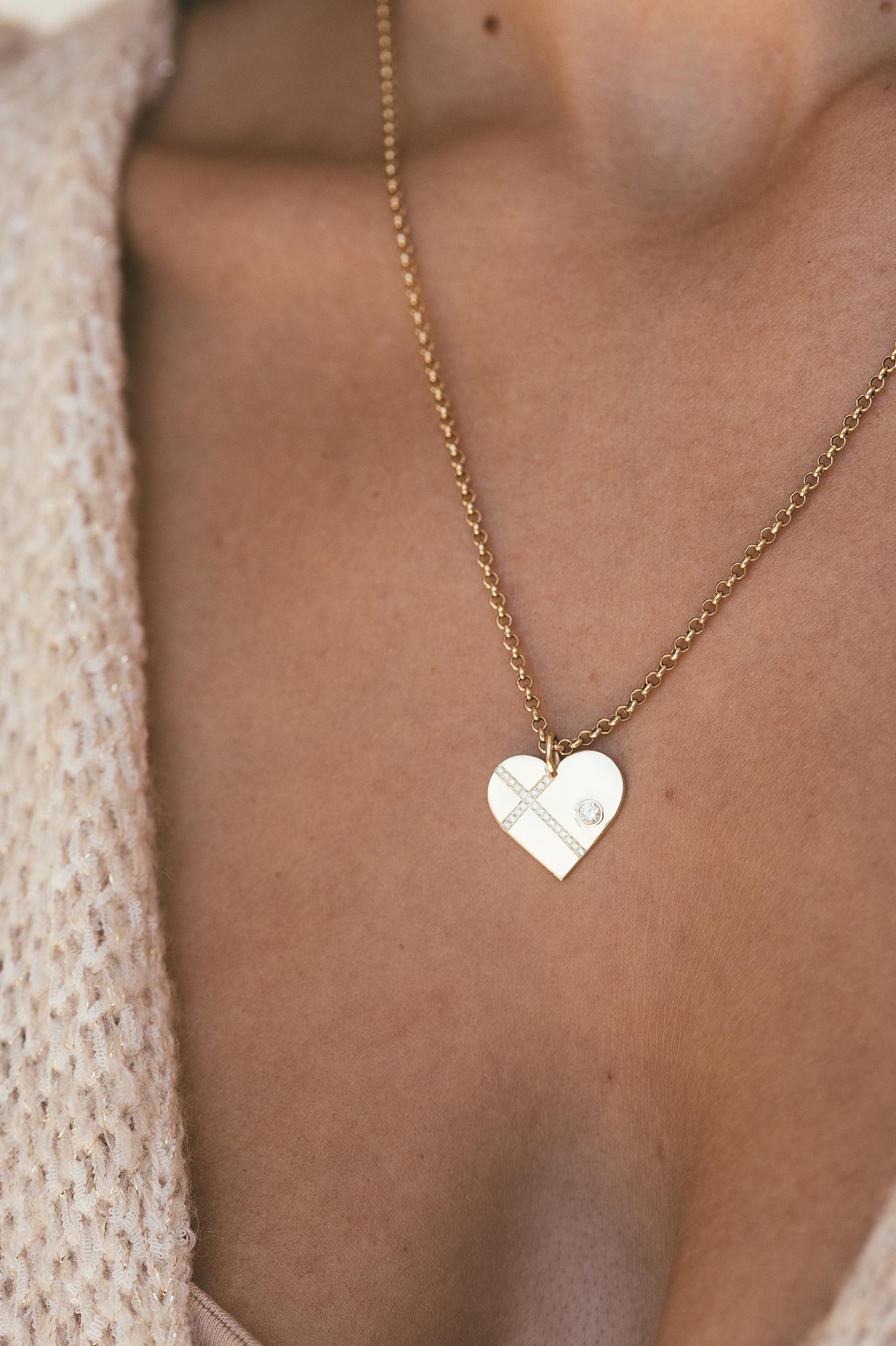 Close up view of heart charm on model